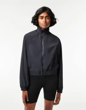 Lacoste Chaqueta Sportsuit corta de nylon con capucha y cremallera